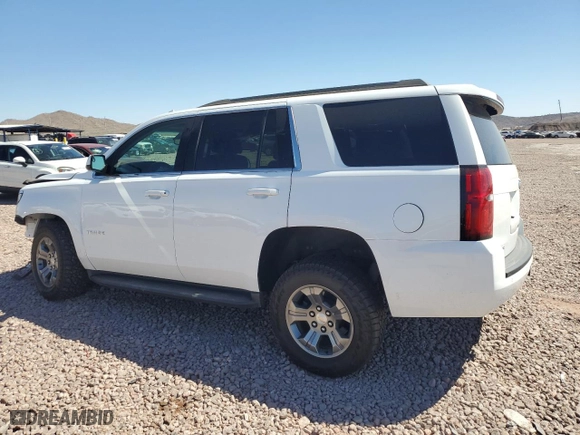 2018 Chevrolet Tahoe LS with VIN 1GNSKAKC6JR258527, listed as a Copart auction lot 71314804 with 69,040 mi miles and Salvage Title. Bid and sale history available at carsss.com. Image 2.