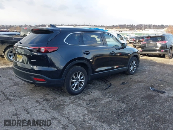 2017 Mazda CX-9 Touring with VIN JM3TCBCY5H0142400, listed as a IAAI auction lot 40987166 with 118,000 mi miles. Bid and sale history available at carsss.com. Image 4.