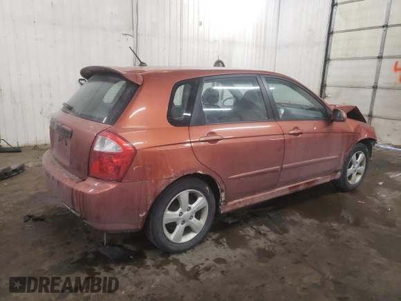 2009 Kia Spectra with VIN KNAFE241995025583, listed as a Copart auction lot 45626095 with 297,361 mi miles and Salvage Title. Bid and sale history available at carsss.com. Image 3.