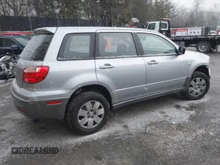 2005 Mitsubishi Outlander LS with VIN JA4LX31F25U045299, listed as a IAAI auction lot 41339369 with 100,697 mi miles. Bid and sale history available at carsss.com. Image 4.