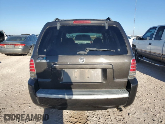 2005 Mercury Mariner Luxury z VIN 4M2CU56125DJ20570, wystawiony jako Copart lot #79758734 z przebiegiem 74 370 mil mil oraz Tytuł czysty. Historia ofert i sprzedaży dostępna na DreamBid. Obrazek 6.
