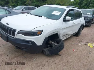 2020 Jeep Cherokee Latitude with VIN 1C4PJMCXXLD578180, listed as a IAAI auction lot 42438023 with 82,845 mi miles and . Bid and sale history available at DreamBid. Image 2.