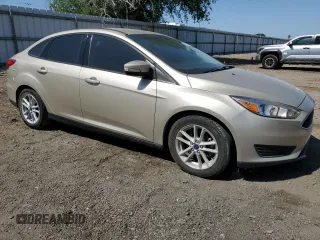 2017 Ford Focus SE with VIN 1FADP3F20HL313685, listed as a Copart auction lot 52607865 with 64,862 mi miles and Salvage Title. Bid and sale history available at DreamBid. Image 4.