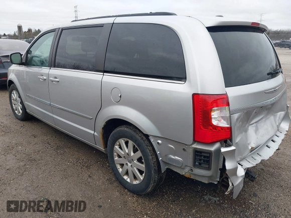 2012 Chrysler Town & Country Touring with VIN 2C4RC1BG8CR170096, listed as a IAAI auction lot 42084407 with 96,296 mi miles. Bid and sale history available at carsss.com. Image 3.
