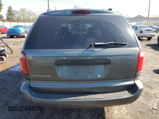 2004 Dodge Caravan SE with VIN 1D4GP24R04B520727, listed as a Copart auction lot 52002475 with 164,954 mi miles and Salvage title. Bid and sale history available at DreamBid. Image 6.