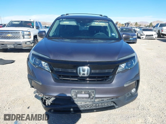 2022 Honda Pilot Special Edition with VIN 5FNYF5H27NB013972, listed as a IAAI auction lot 41219766 with 52,291 mi miles and . Bid and sale history available at carsss.com. Image 12.