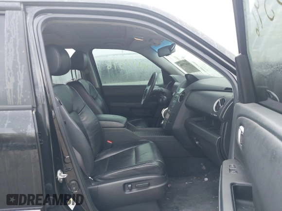 2011 Honda Pilot Touring with VIN 5FNYF4H94BB089930, listed as a IAAI auction lot 41477596 with 171,831 mi miles. Bid and sale history available at carsss.com. Image 5.