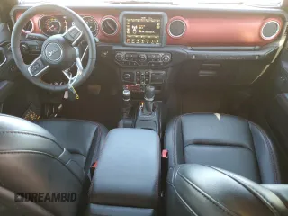 2023 Jeep Wrangler Rubicon z VIN 1C4HJXFN2PW617435, wystawiony jako Copart lot #75409114 z przebiegiem 12 185 mil mil oraz Szkoda całkowita • Salvage title. Historia ofert i sprzedaży dostępna na DreamBid. Obrazek 8.