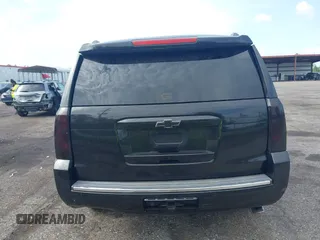 2015 Chevrolet Tahoe LTZ with VIN 1GNSCCKC5FR103676, listed as a IAAI auction lot 42456913 with 214,009 mi miles and . Bid and sale history available at DreamBid. Image 15.
