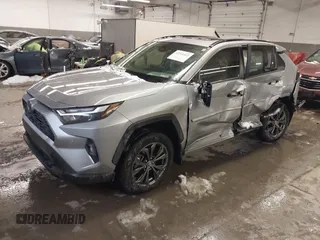 2024 Toyota RAV4 Hybrid XLE Premium with VIN JTMB6RFV5RD148973, listed as a IAAI auction lot 41516422 with 8,797 mi miles. Bid and sale history available at carsss.com. Image 17.