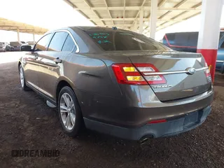 2015 Ford Taurus SEL with VIN 1FAHP2H87FG176103, listed as a IAAI auction lot 41950844 with 205,014 mi miles. Bid and sale history available at carsss.com. Image 3.