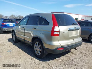 2008 Honda CR-V EX with VIN JHLRE38598C014034, listed as a IAAI auction lot 41678378 with 142,561 mi miles. Bid and sale history available at carsss.com. Image 3.