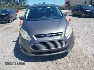 2013 Ford C-Max SEL z VIN 1FADP5BU8DL545447, wystawiony jako IAAI lot #42327754 z przebiegiem 335 658 mil mil oraz . Historia ofert i sprzedaży dostępna na DreamBid. Obrazek 6.