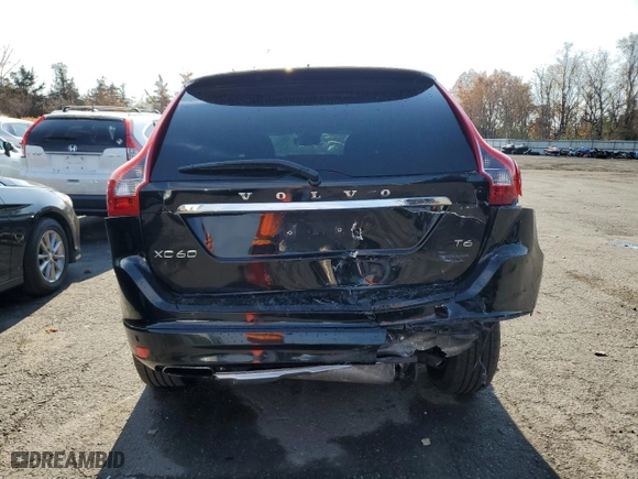 2015 Volvo XC60 T6 Drive-E with VIN YV449MDK8F2642602, listed as a Copart auction lot 77088034 with 154,531 mi miles and Salvage Title. Bid and sale history available at carsss.com. Image 6.