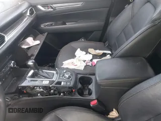 2018 Mazda CX-5 Grand Touring z VIN JM3KFADM5J1365772, wystawiony jako IAAI lot #42251805 z przebiegiem 44 599 mil mil oraz . Historia ofert i sprzedaży dostępna na DreamBid. Obrazek 5.