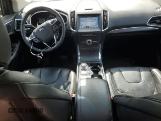 2019 Ford Edge Titanium z VIN 2FMPK3K97KBB49427, wystawiony jako Copart lot #57765745 z przebiegiem 43 656 mil mil oraz Szkoda całkowita • Salvage title. Historia ofert i sprzedaży dostępna na DreamBid. Obrazek 8.