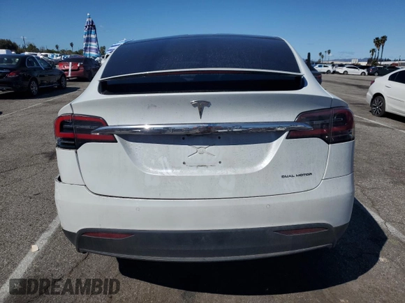 2020 Tesla Model X Long Range with VIN 5YJXCAE26LF270135, listed as a Copart auction lot 49711735 with Not Provided miles and Salvage Title. Bid and sale history available at carsss.com. Image 6.