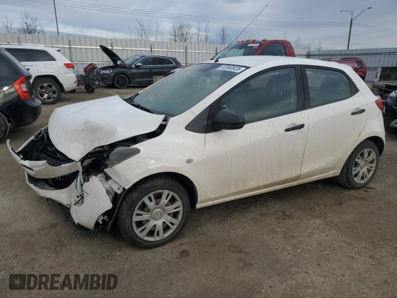 2012 Mazda 2 Sport with VIN JM1DE1KY8C0145089, listed as a Copart auction lot 52093925 with 211,282 mi miles and Salvage Title. Bid and sale history available at DreamBid. Image 1.