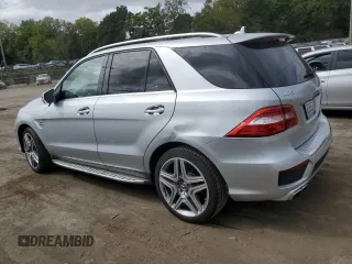 2013 Mercedes-Benz M ML 63 AMG with VIN 4JGDA7EB0DA153930, listed as a Copart auction lot 72535344 with 129,030 mi miles and Salvage Title. Bid and sale history available at carsss.com. Image 2.