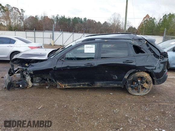 2016 Jeep Cherokee Latitude with VIN 1C4PJLCSXGW229710, listed as a IAAI auction lot 41094091 with 131,501 mi miles. Bid and sale history available at carsss.com. Image 14.