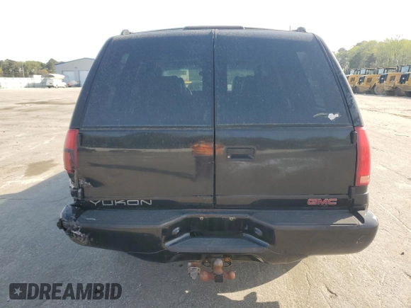 1999 GMC Denali with VIN 1GKEK13R1XR912632, listed as a Copart auction lot 51223085 with 223,201 mi miles and Salvage Title. Bid and sale history available at carsss.com. Image 6.