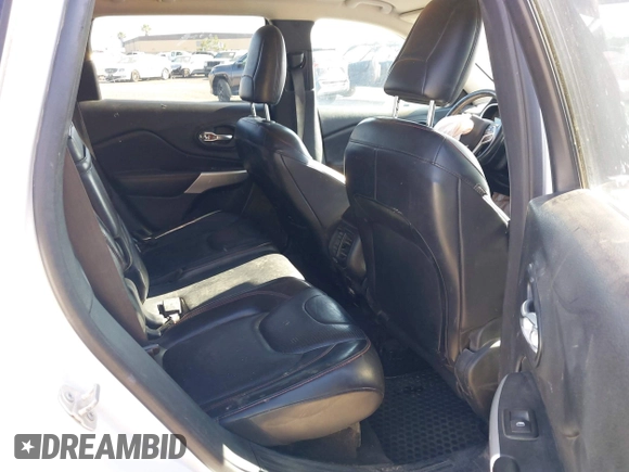 2017 Jeep Cherokee Trailhawk L Plus z VIN 1C4PJMBS1HD217370, wystawiony jako IAAI lot #42486588 z przebiegiem 108 695 mil mil oraz . Historia ofert i sprzedaży dostępna na DreamBid. Obrazek 8.