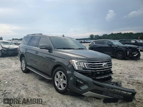 2019 Ford Expedition XLT with VIN 1FMJU1HT7KEA15609, listed as a Copart auction lot 61398885 with 57,092 mi miles and Salvage title. Bid and sale history available at DreamBid. Image 14.