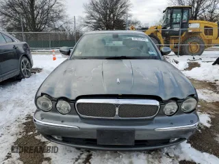 2006 Jaguar XJ with VIN SAJWA79B06SH07721, listed as a Copart auction lot 87851345 with 93,004 mi miles and Salvage Title. Bid and sale history available at carsss.com. Image 5.
