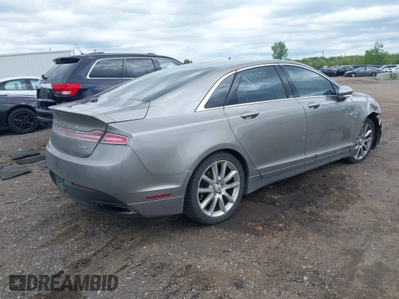 2015 Lincoln MKZ z VIN 3LN6L2J99FR604385, wystawiony jako IAAI lot #42332078 z przebiegiem 116 862 mil mil oraz . Historia ofert i sprzedaży dostępna na DreamBid. Obrazek 4.