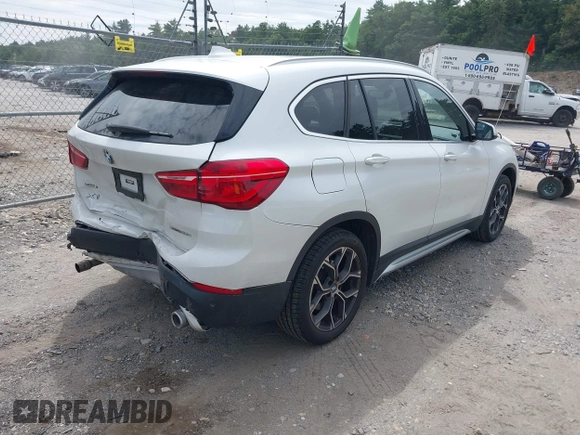 2021 BMW X1 xDrive28i with VIN WBXJG9C07M5U21337, listed as a IAAI auction lot 42590859 with 35,934 mi miles and . Bid and sale history available at DreamBid. Image 4.