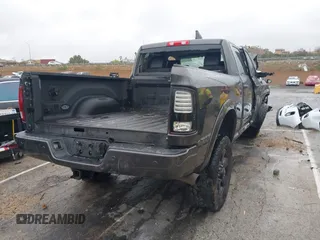 2018 Ram 2500 Laramie with VIN 3C6UR5FL6JG382481, listed as a IAAI auction lot 41517536 with Not provided miles and . Bid and sale history available at DreamBid. Image 4.