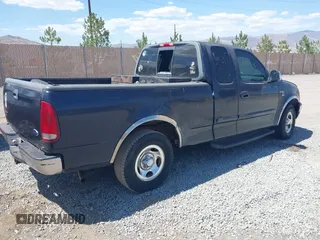 2001 Ford F-150 XL with VIN 1FTRX17L41NA08695, listed as a IAAI auction lot 42558909 with 267,203 mi miles and . Bid and sale history available at DreamBid. Image 4.