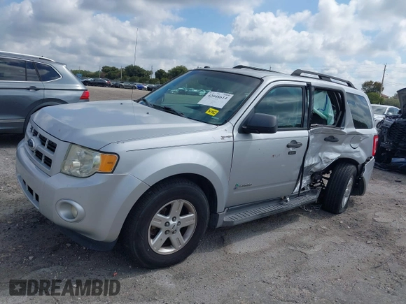 2011 Ford Escape Hybrid with VIN 1FMCU4K3XBKC60103, listed as a IAAI auction lot 42048614 with 125,354 mi miles and . Bid and sale history available at DreamBid. Image 6.