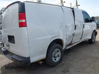2014 Chevrolet Express Cargo Van with VIN 1GCWGFCA7E1110011, listed as a IAAI auction lot 41983301 with 114,827 mi miles. Bid and sale history available at carsss.com. Image 4.