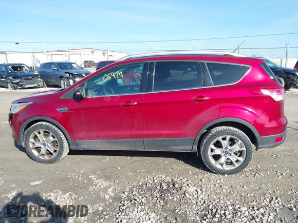 2015 Ford Escape Titanium z VIN 1FMCU9J9XFUC75357, wystawiony jako IAAI lot #41705474 z przebiegiem 198 381 mil mil oraz . Historia ofert i sprzedaży dostępna na DreamBid. Obrazek 14.