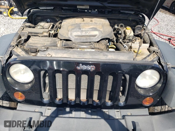 2013 Jeep Wrangler Sport with VIN 1C4AJWAG5DL694110, listed as a Copart auction lot 52200885 with 187,924 mi miles and Salvage Title. Bid and sale history available at carsss.com. Image 11.