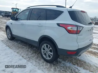2018 Ford Escape SE with VIN 1FMCU0GD1JUC48757, listed as a IAAI auction lot 41631583 with 80,700 mi miles. Bid and sale history available at carsss.com. Image 3.
