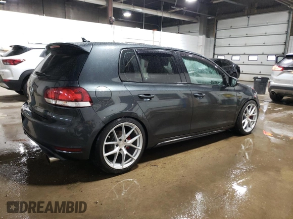 2013 Volkswagen GTI с VIN WVWGD7AJXDW129840, выставлен на аукционе Copart как лот 52946845 с пробегом 118 520 миль миль и Списание • Salvage title. История ставок и продаж доступна на DreamBid. Изображение 3.
