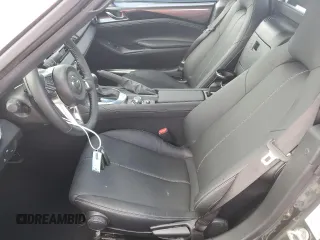 2024 Mazda MX-5 Miata Grand Touring z VIN JM1NDAM73R0603254, wystawiony jako Copart lot #74551704 z przebiegiem Nie podano mil oraz Nie do naprawy • Non repairable. Historia ofert i sprzedaży dostępna na DreamBid. Obrazek 7.
