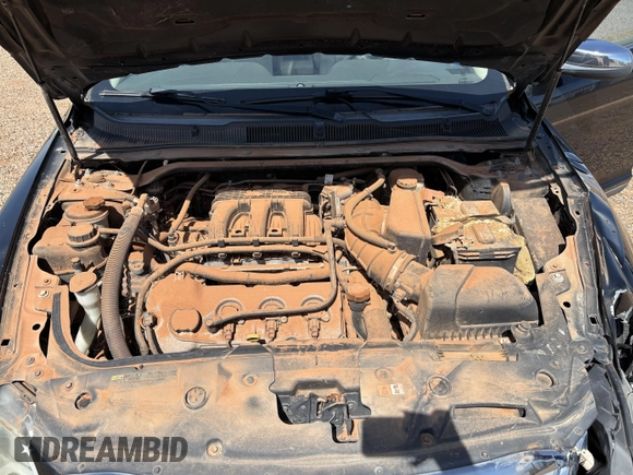 2010 Ford Taurus Limited with VIN 1FAHP2FW3AG125031, listed as a IAAI auction lot 42801338 with 128,310 mi miles and . Bid and sale history available at DreamBid. Image 9.