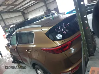 2018 Kia Sportage LX with VIN KNDPMCACXJ7446520, listed as a IAAI auction lot 41568985 with 79,601 mi miles and . Bid and sale history available at DreamBid. Image 3.