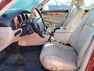 1999 Jaguar XJ with VIN SAJPX1849XC857869, listed as a Copart auction lot 83773914 with 172,496 mi miles and Clean title. Bid and sale history available at DreamBid. Image 7.