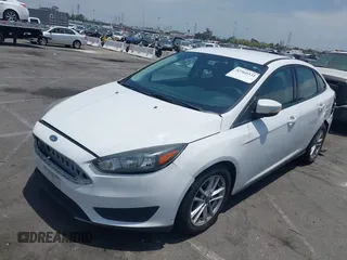 2017 Ford Focus SE with VIN 1FADP3F21HL217838, listed as a IAAI auction lot 42560331 with 154,406 mi miles and . Bid and sale history available at DreamBid. Image 2.