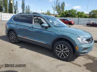 2021 Volkswagen Tiguan SE z VIN 3VV3B7AX6MM041166, wystawiony jako Copart lot #57769445 z przebiegiem 51 030 mil mil oraz Nie do naprawy • Non repairable. Historia ofert i sprzedaży dostępna na DreamBid. Obrazek 4.
