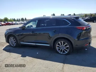 2020 Mazda CX-9 Grand Touring z VIN JM3TCADYXL0414926, wystawiony jako Copart lot #57528945 z przebiegiem 93 768 mil mil oraz Szkoda całkowita • Salvage title. Historia ofert i sprzedaży dostępna na DreamBid. Obrazek 2.