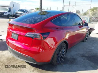 2024 Tesla Model Y Performance with VIN 7SAYGDEF3RF032980, listed as a IAAI auction lot 41619450 with 12,105 mi miles and . Bid and sale history available at DreamBid. Image 4.