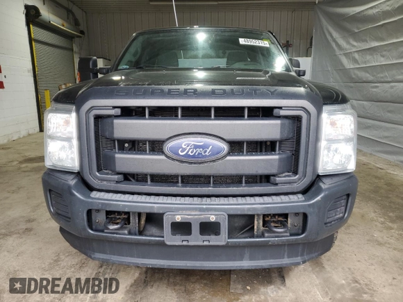 2015 Ford Super Duty F-250 SRW XLT with VIN 1FT7X2B68FED30455, listed as a Copart auction lot 48952315 with 179,081 mi miles and Salvage Title. Bid and sale history available at carsss.com. Image 5.