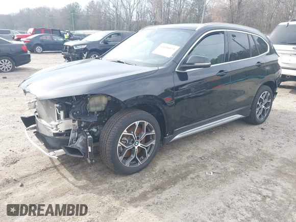 2021 BMW X1 xDrive28i with VIN WBXJG9C05M5T83784, listed as a IAAI auction lot 41696073 with 15,865 mi miles and . Bid and sale history available at DreamBid. Image 2.