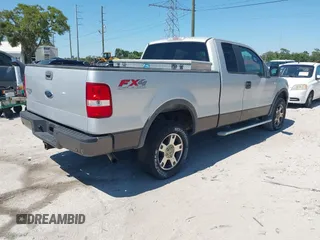 2005 Ford F-150 XLT with VIN 1FTPX14565KC84798, listed as a IAAI auction lot 42064262 with 149,534 mi miles. Bid and sale history available at carsss.com. Image 4.