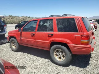 1997 Jeep Grand Cherokee Limited with VIN 1J4GZ78Y7VC573971, listed as a Copart auction lot 61358024 with 171,055 mi miles and Salvage Title. Bid and sale history available at carsss.com. Image 2.